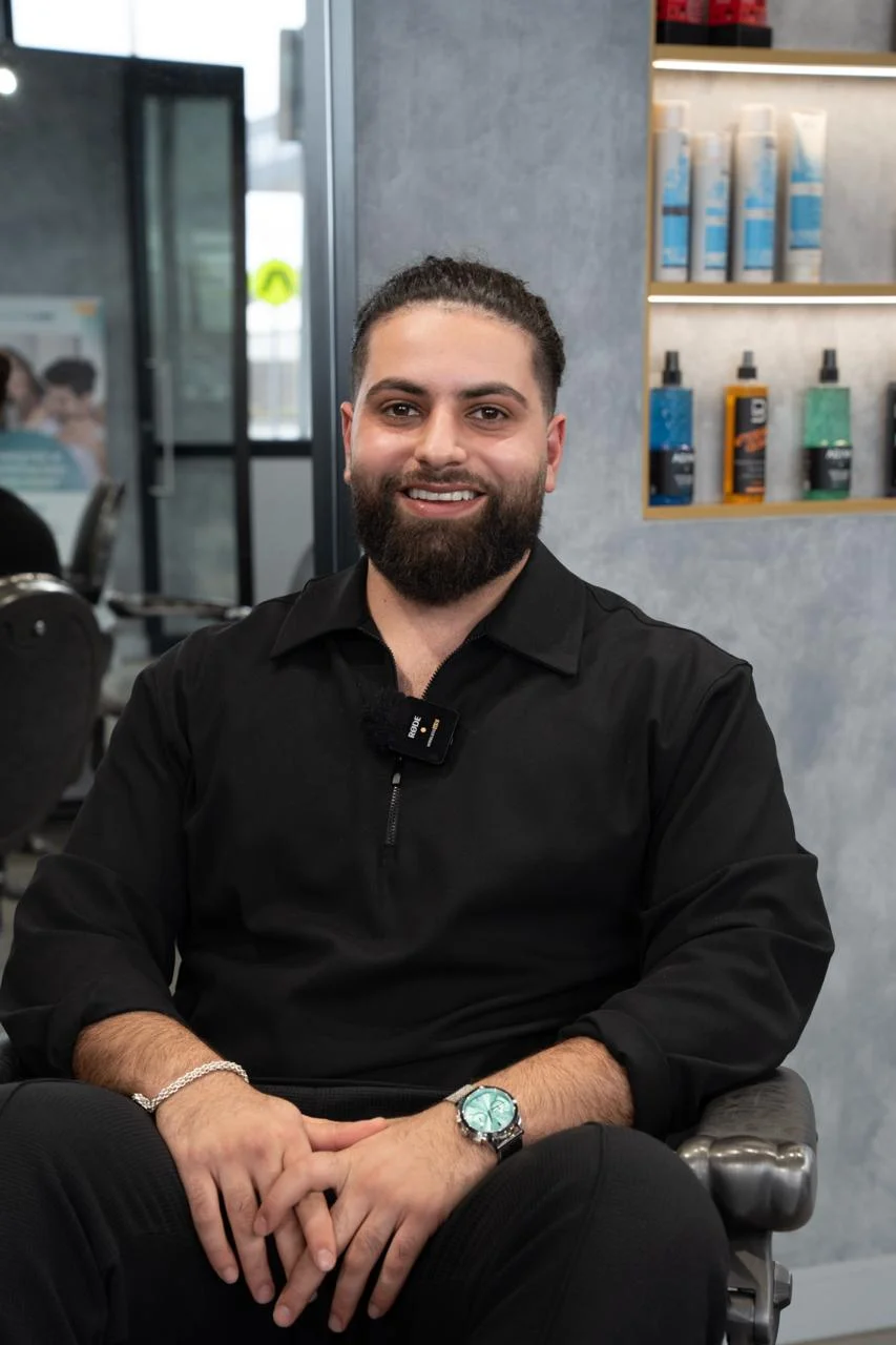 Alessandro Romano, Master Barber from Italy, performing a professional haircut